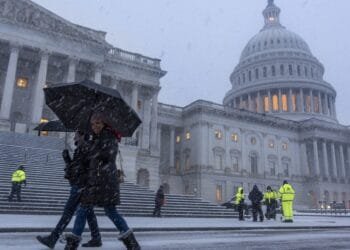 Snow and freezing rain cause crashes in Virginia while California prepares for likely flooding