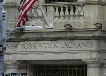 Stock market today: Discouraging economic reports knock Wall Street further from its record