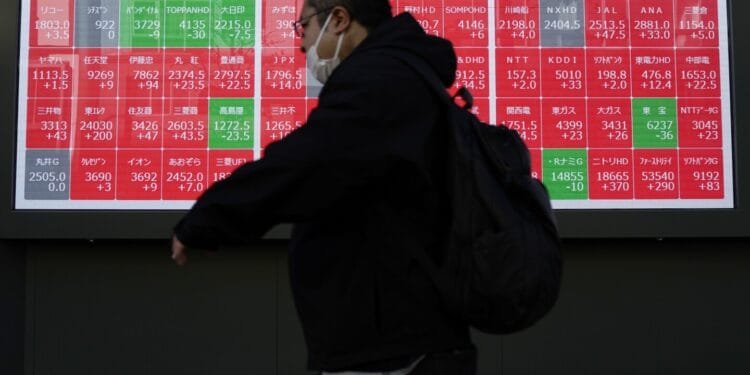 Stock market today: World shares are mostly lower after Wall Street edged back from its record