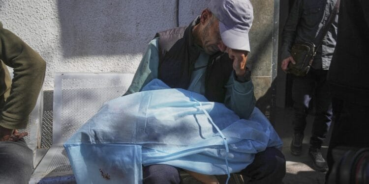 Strikes across Gaza kill at least 92 as Israel prepares to ramp up its offensive