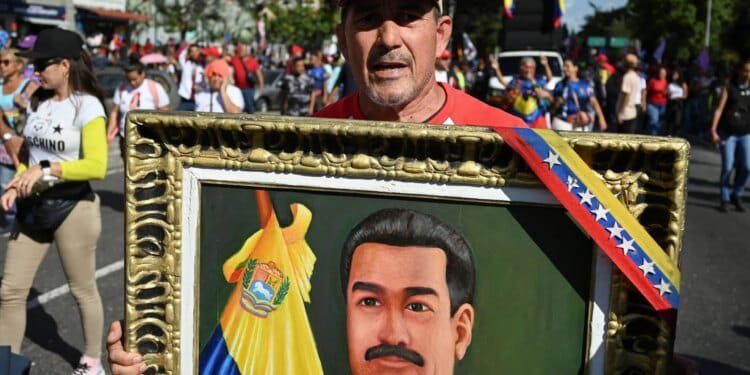Thousands march in Venezuela to demand US frees President Maduro, wife