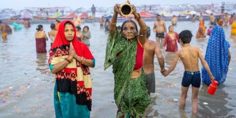 Thousands of Hindus bathe in sacred waters at India’s Kumbh Mela festival 1 Thousands of Hindus bathe in sacred waters at India’s Kumbh Mela festival