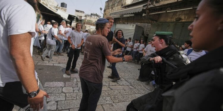 Thousands of Israeli nationalists chant ‘death to Arabs’ during annual procession through Jerusalem