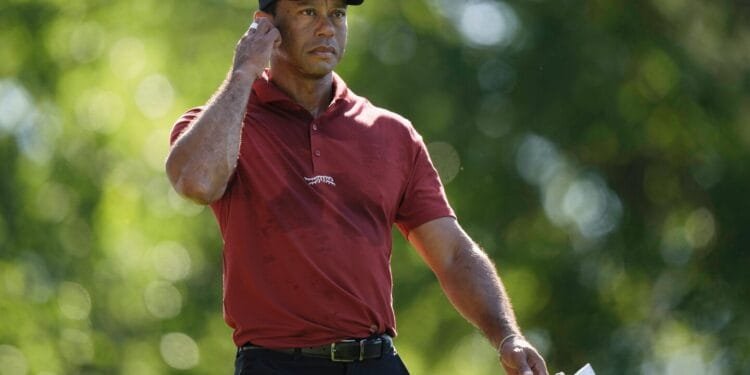 Tiger Woods says he ruptured his Achilles tendon, an injury that will keep him out of the Masters