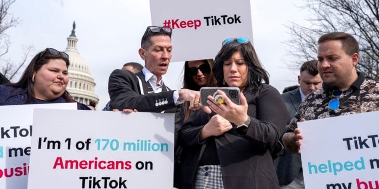 Trump says he may cut China tariffs to secure TikTok deal