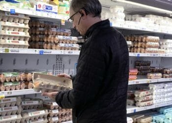 US inflation cooled last month, though trade war threatens to lift prices