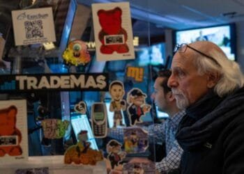 US shares and bonds cling on to inflation-driven gains