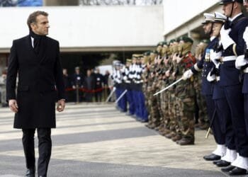 Wake up and spend more on defense, Macron tells Europe as Trump takes office