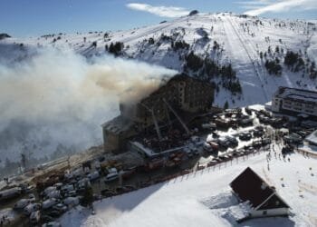 Witnesses at a Turkish ski resort stood helpless as people leaped out of a burning hotel