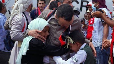 Abdelkhaleq Amran, a freed Yemeni journalist, meets his children in Marib, Yemen, 16 April 2023. Prisoner exchange talks over the weekend between Yemen's government and Houthi rebels in Muscat ended without a full agreement. EPA