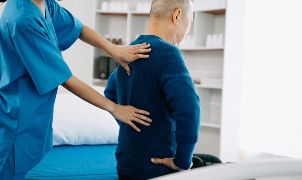 doctor consulting with patient back problems physical therapy conceptxaxa